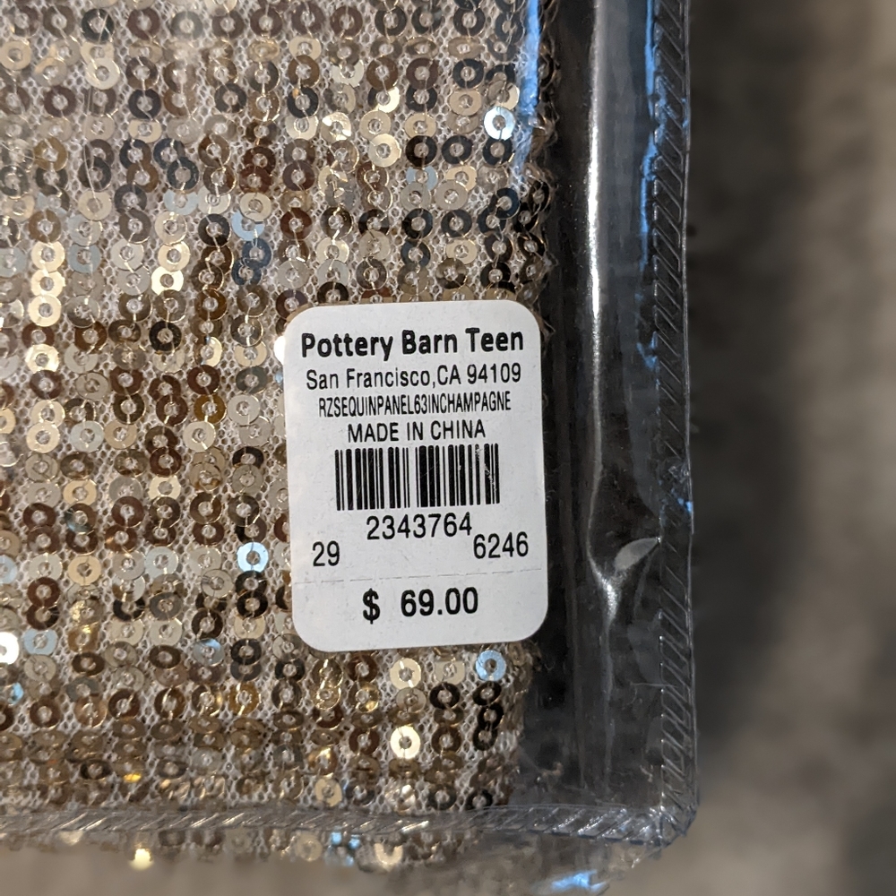 Gold sequin curtain panel